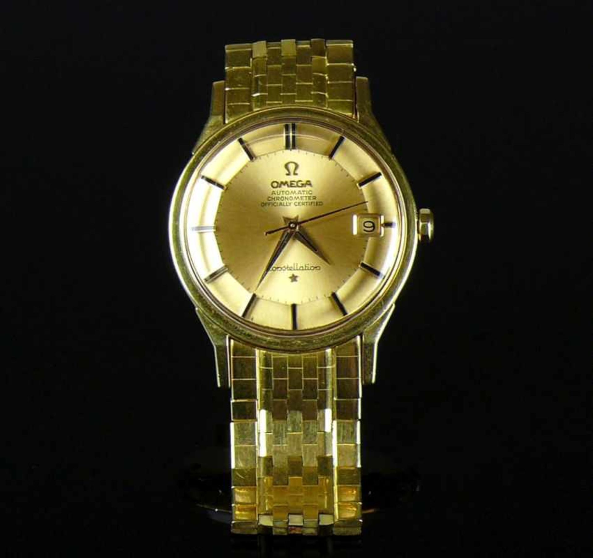 OMEGA-Constellation-Herrenarmbanduhr (ca. 1970)Automatik; Cal. 564; goldfarbenes Ziffernblatt;