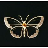 Schmetterling-Brosche18ct GG; besetzt mit honigfarbenem Stein; 4,8g; B: 5 cm
