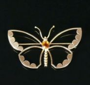 Schmetterling-Brosche18ct GG; besetzt mit honigfarbenem Stein; 4,8g; B: 5 cm