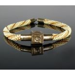 BAZAK-HalsketteKette als dickes, geflochtenes Glasperlenband; zentraler Abschluss in Silbermontur;