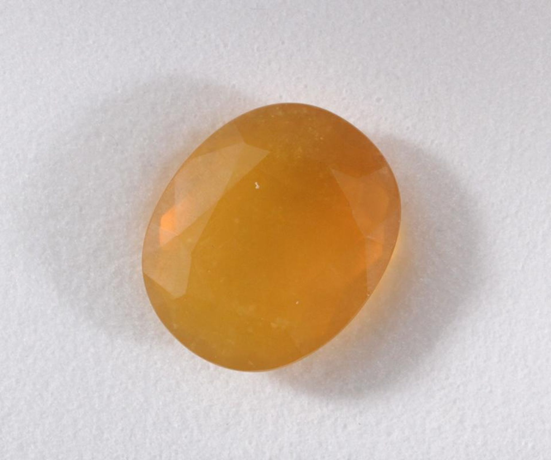 Feueropal von 43 KaratGelb, oval, ca. 28 x 25 x 18 mm