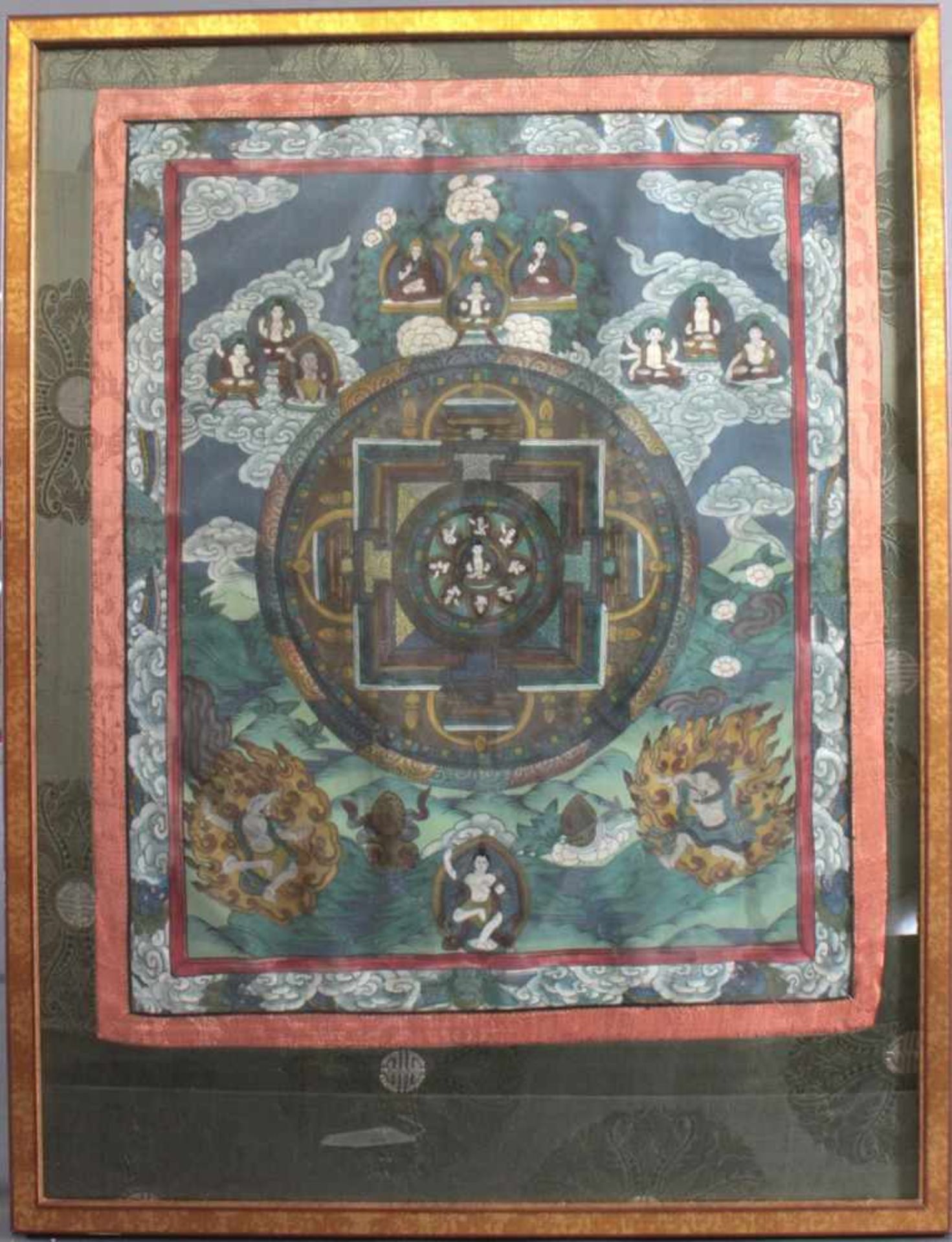 Thanka, Tibet um 1900Aufwändige Darstellung von Buddha, der Göttin Shiva und Ganesha, hinter Glas