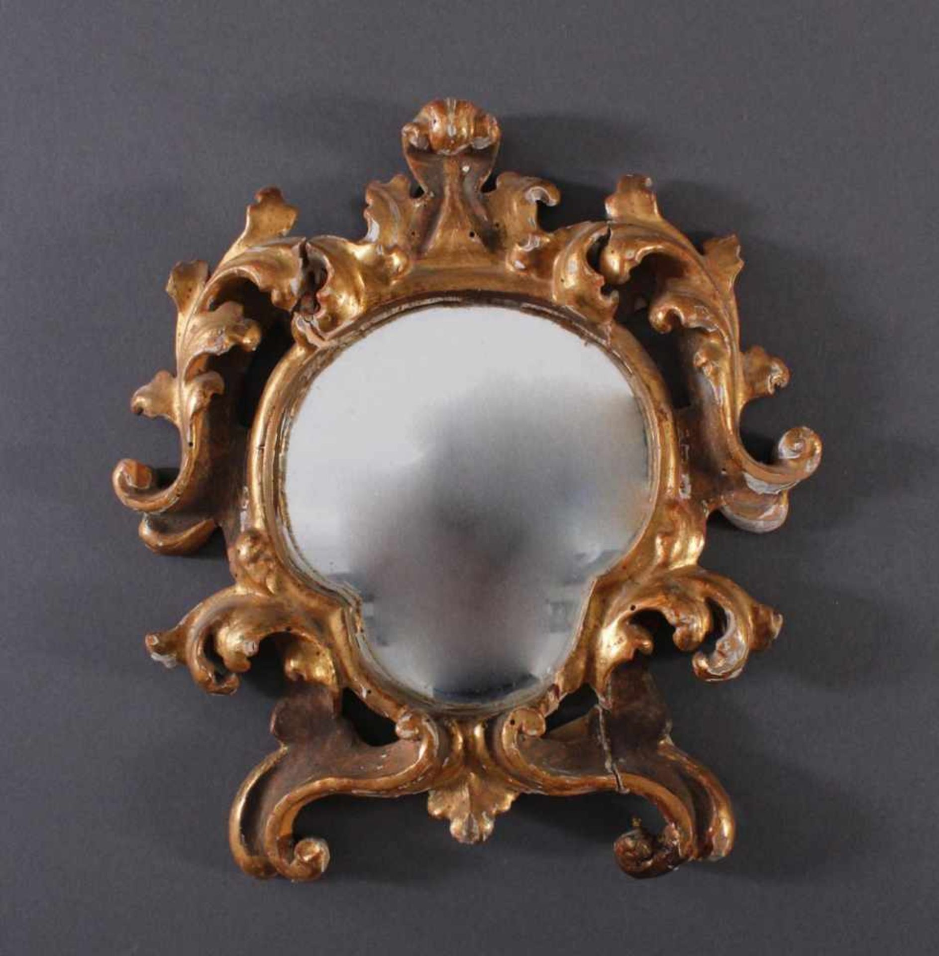 Kleiner Barockspiegel, 18. Jh.Holz geschnitzt, vergoldet, altes Glas, Abplatzungen,