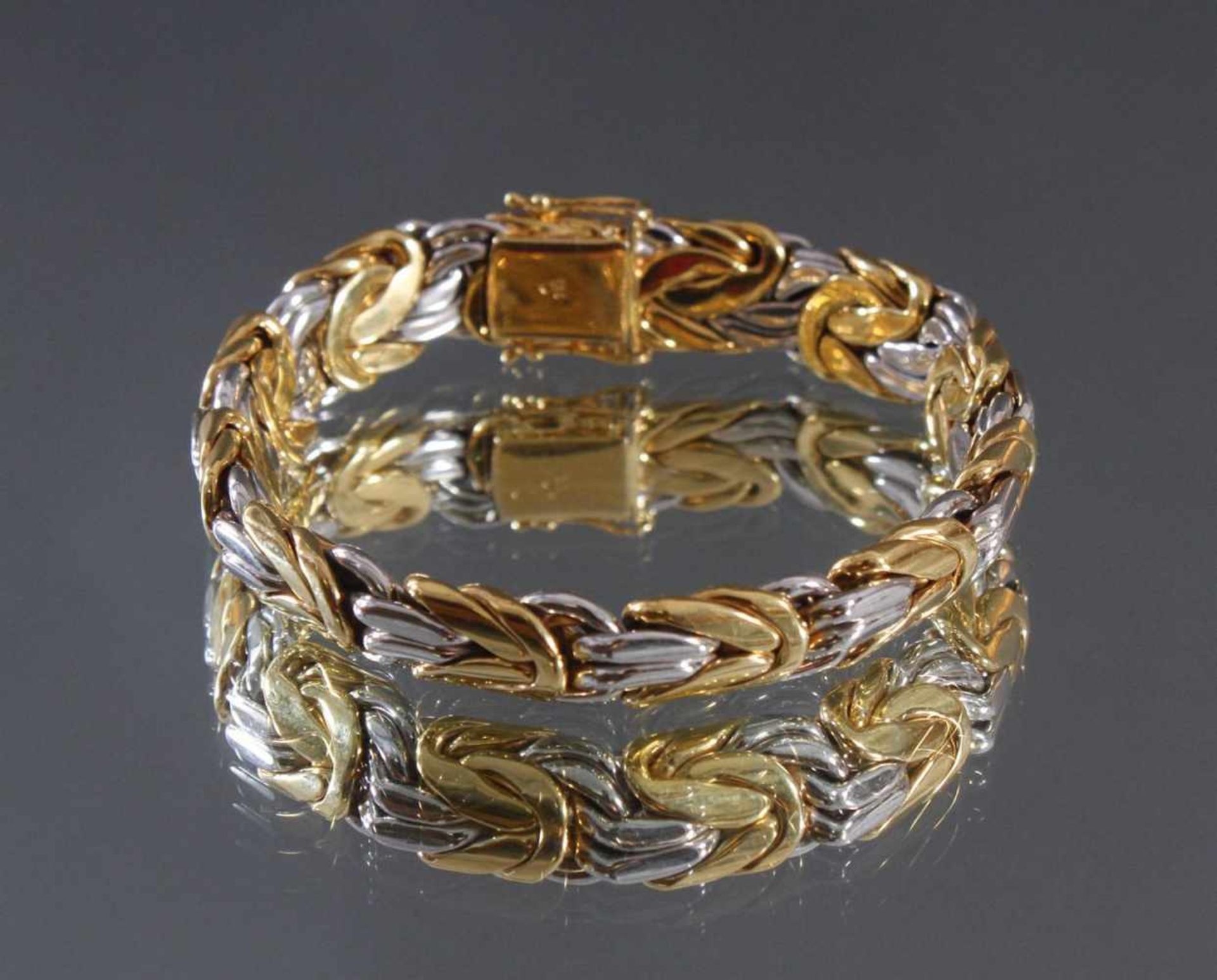 Königsarmband aus 14 Karat Weiß- und GelbgoldAn der Schließe punziert 585, ca. Länge 20,5 cm, 42,5