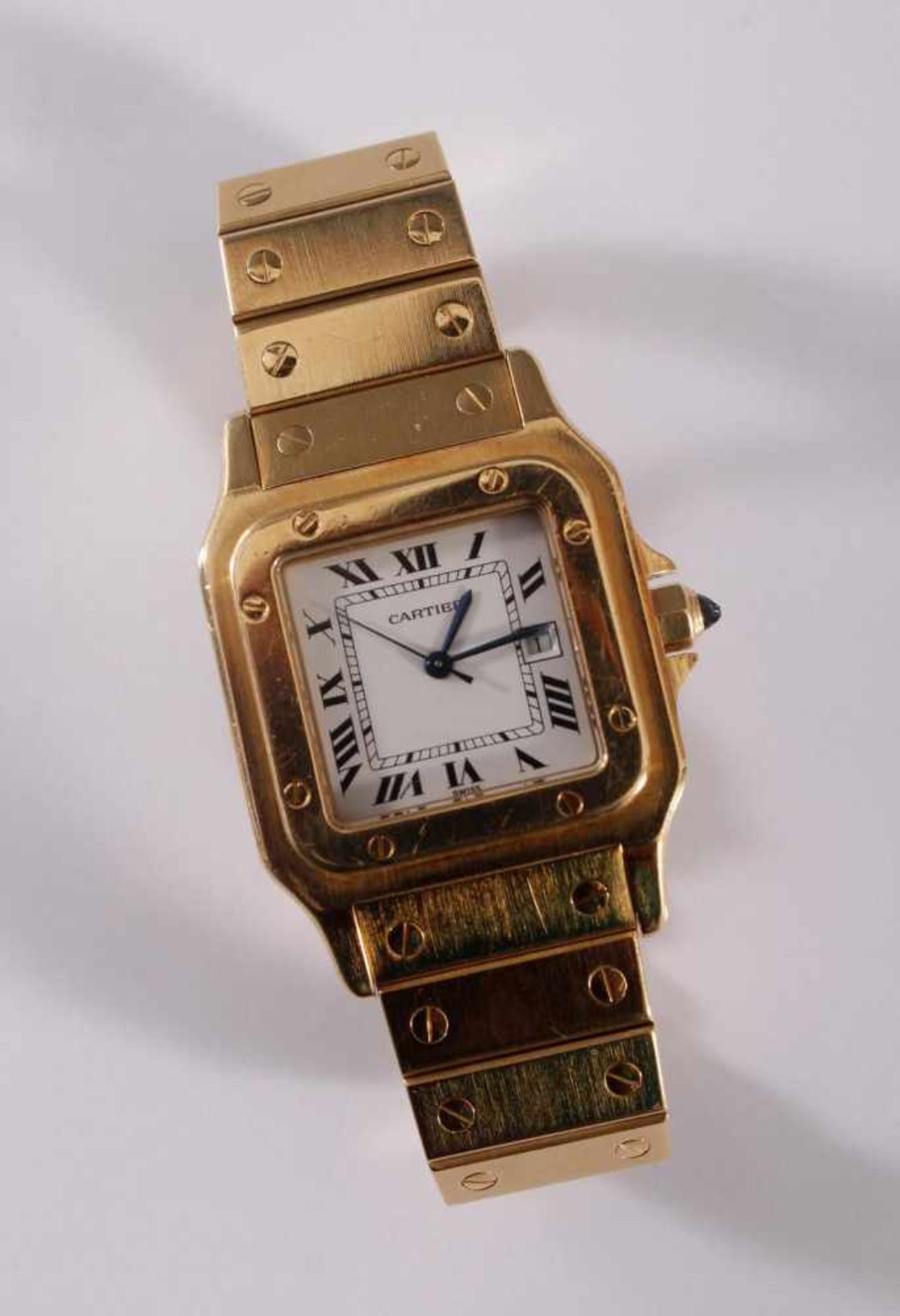 Cartier Herrenarmbanduhr Santos18 Karat Gelbgold. Mit 18 Karat Gliederarmband, hier mit zwei