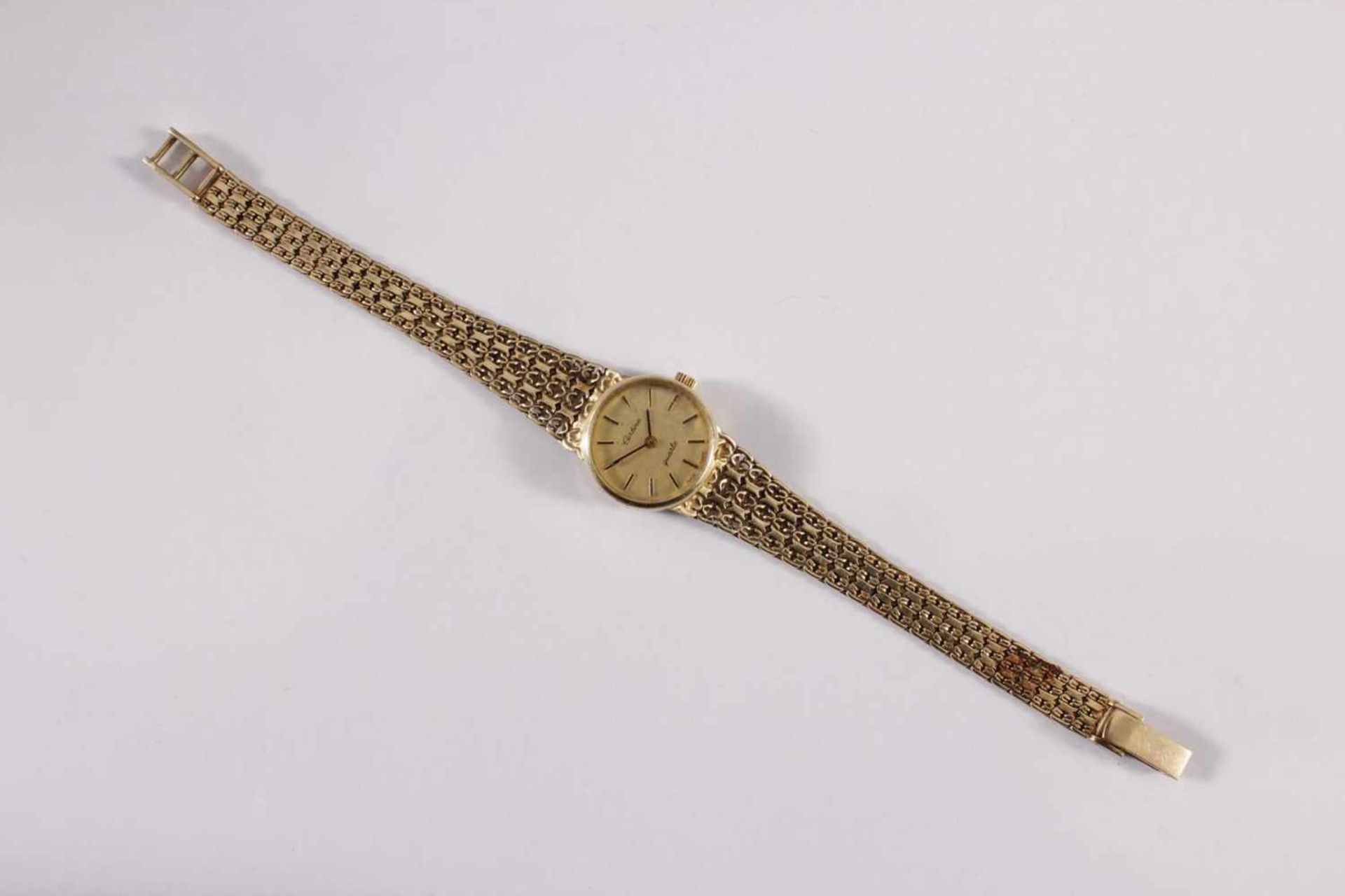 Damenarmbanduhr der Marke Sertina, 14 kt GelbgoldAm Verschluss punziert 585, auf dem Uhrendeckel