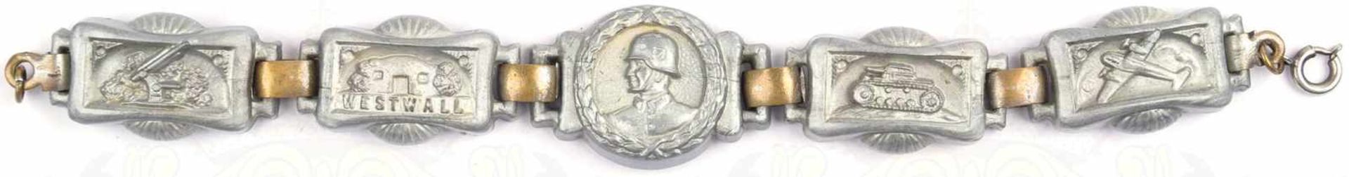 WESTWALL-ARMBAND, 1939/1940, Kunststoff, 5 Kettenglieder m. relief. Soldatenportrait, Bunker, Flak-