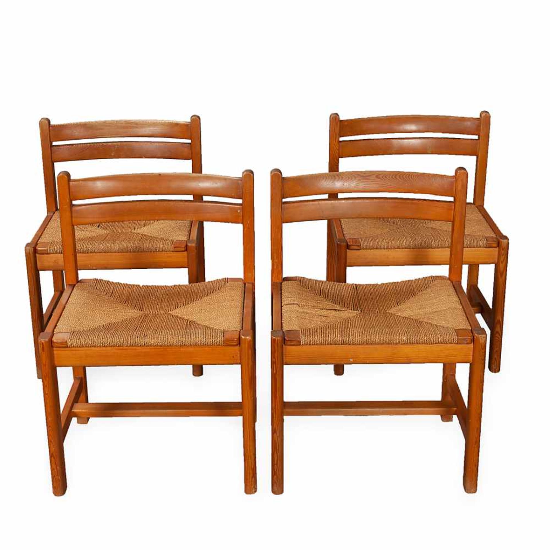 BORGE MOGESEN. Set of four low chairs "Asserbo". Pinewood and original upholstery in rattan.Design