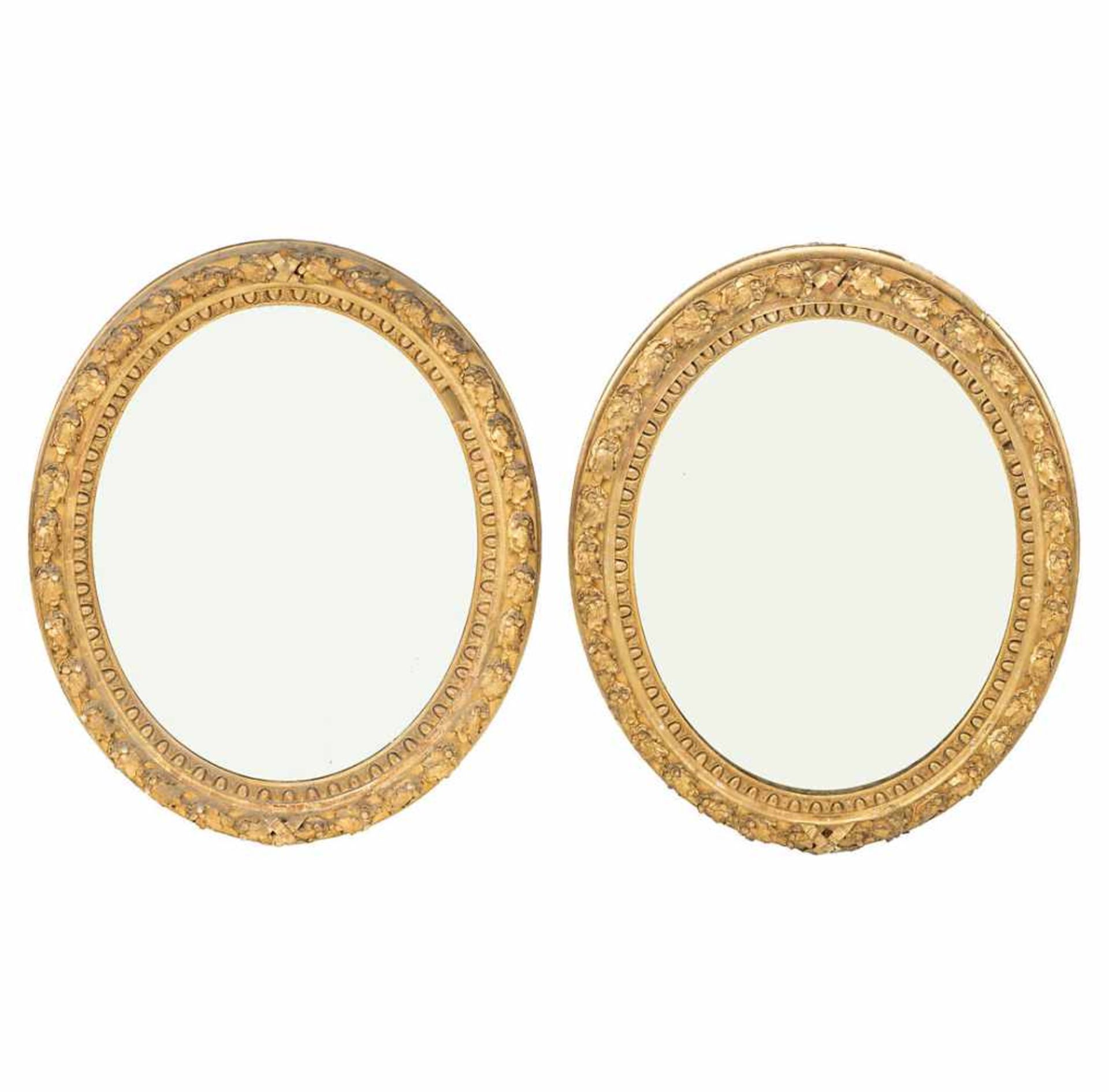 Pair of large oval mirrors with Napoleon III frames in gilt wood and stucco, third quarter of the