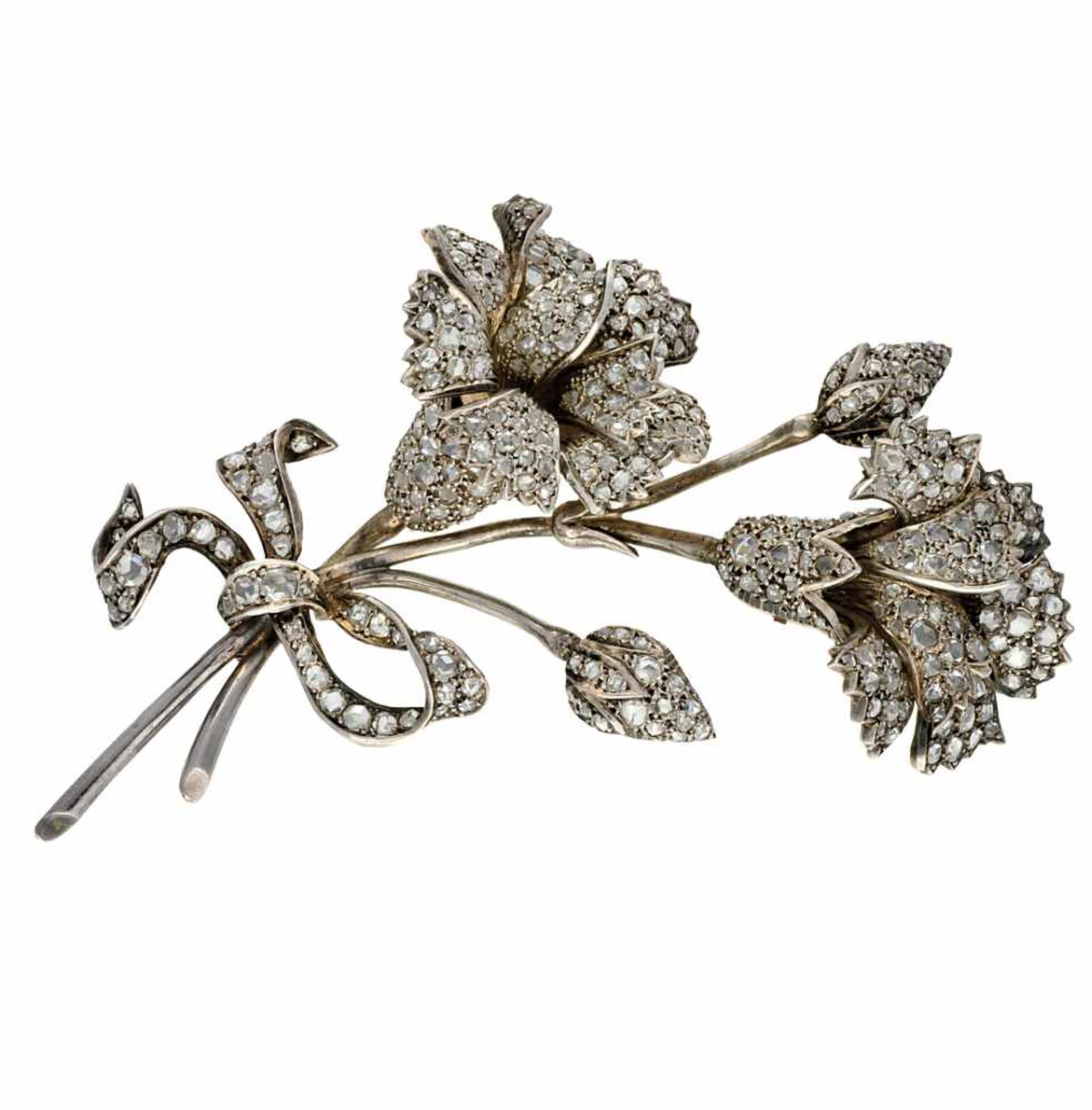 Diamonds floral brooch, late 19th - early 20th Century.Gold with silver views and rose cut diamonds,