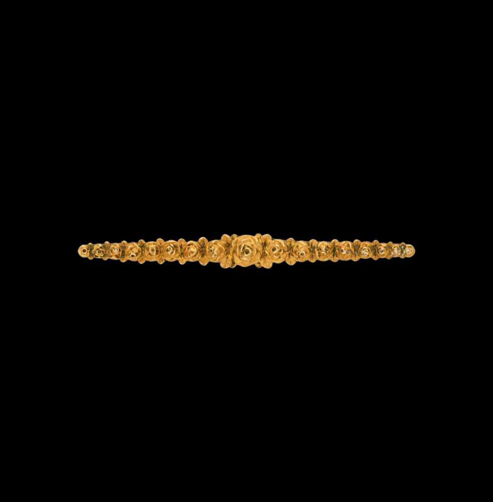 Noucentist brooch in gold, circa 1930.Gold. Hallmarked. 1x9.9 cm. 14.6 gr. It includes a tie
