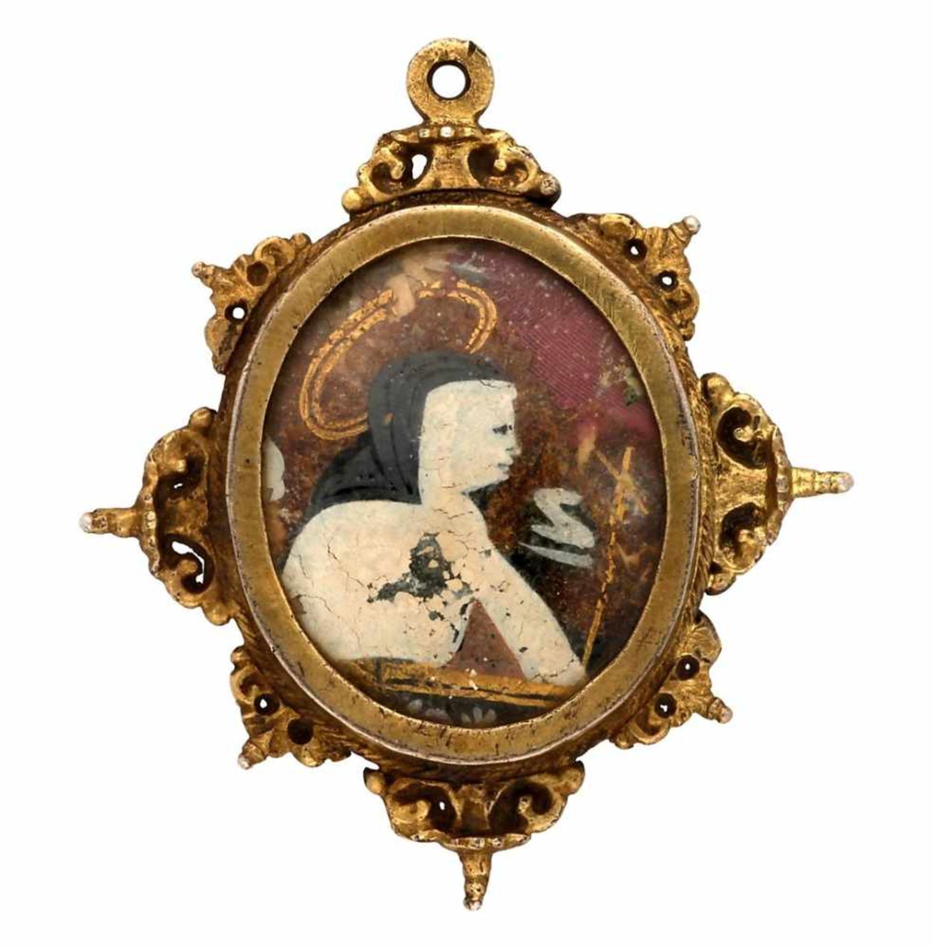 Silver reliquary pendant, 17th Century.Gilded silver and central miniature representing Saint Teresa