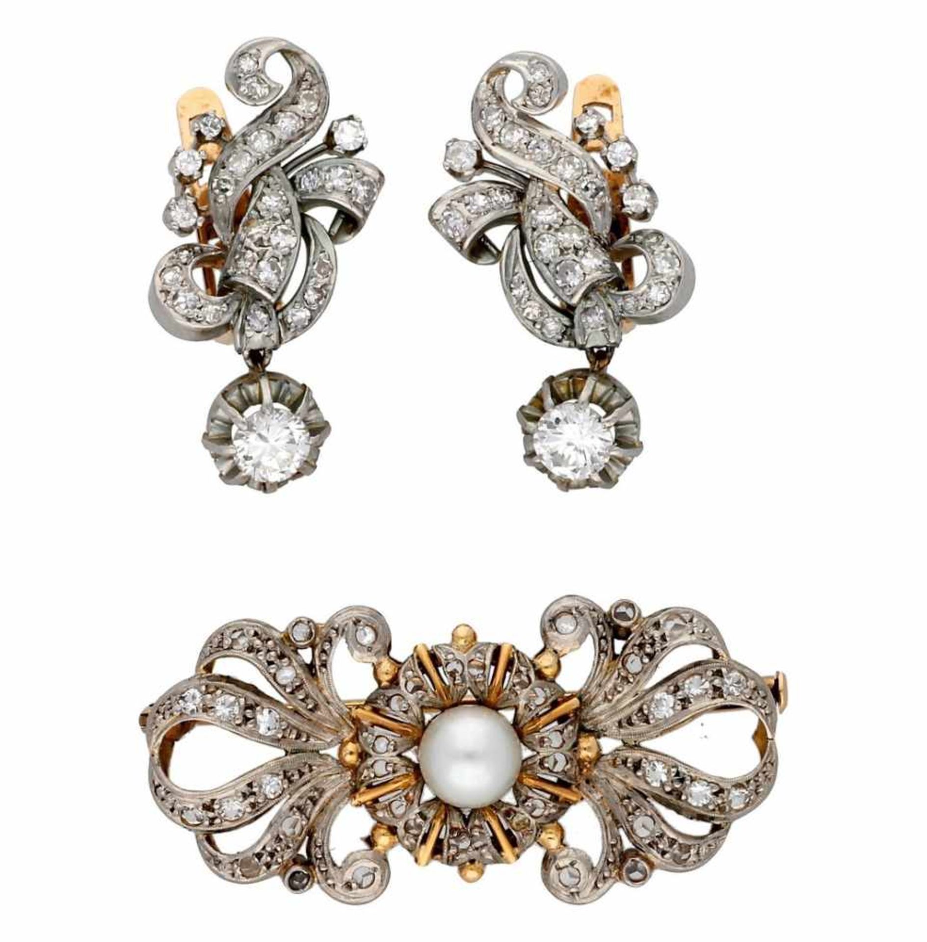 Brooch and earrings, circa 1940.Brooch in gold with white gold views, colourless topazes and