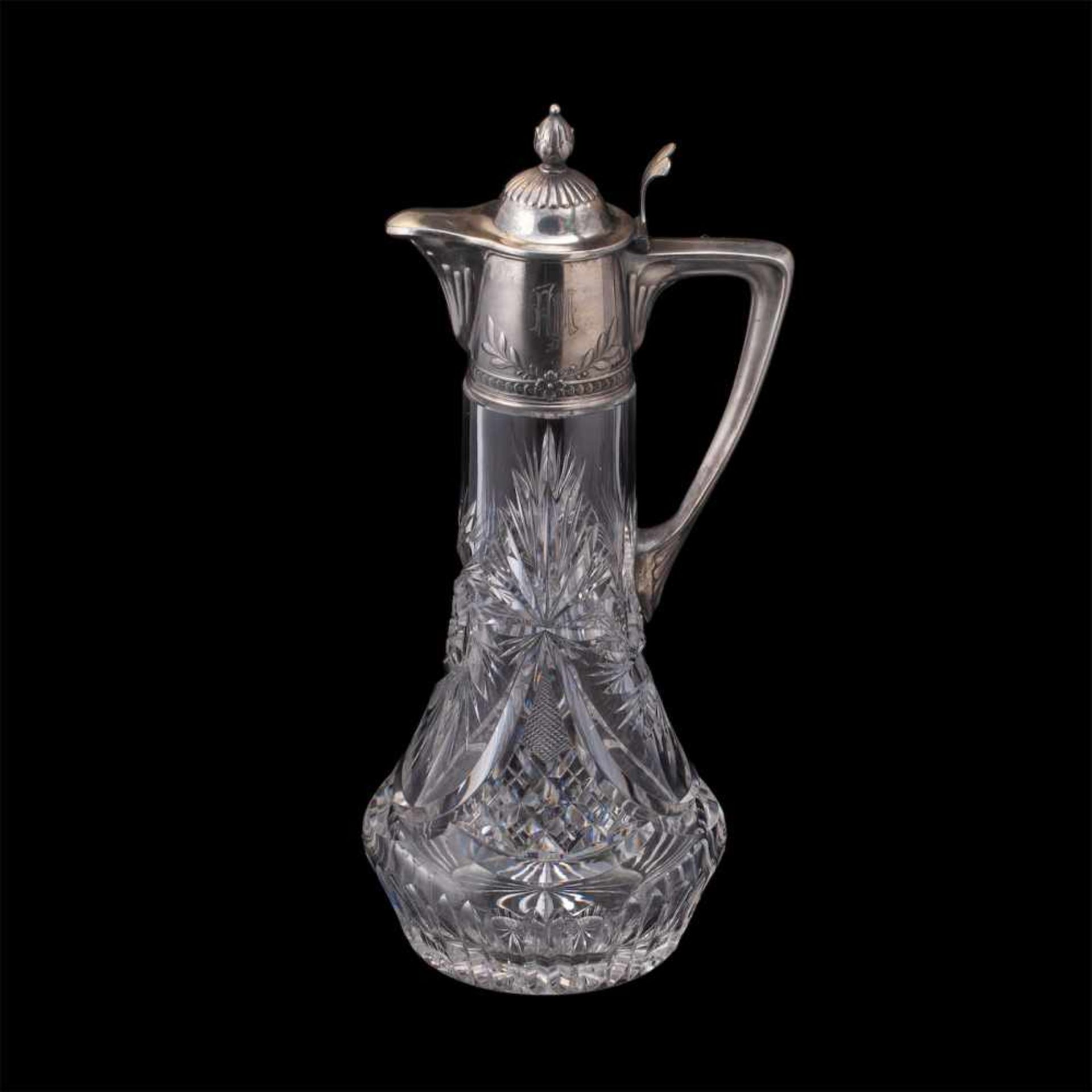 A massive Russian cut-glass carafe. A. LubavinA massive Russian silver-gilt and cut-glass carafe