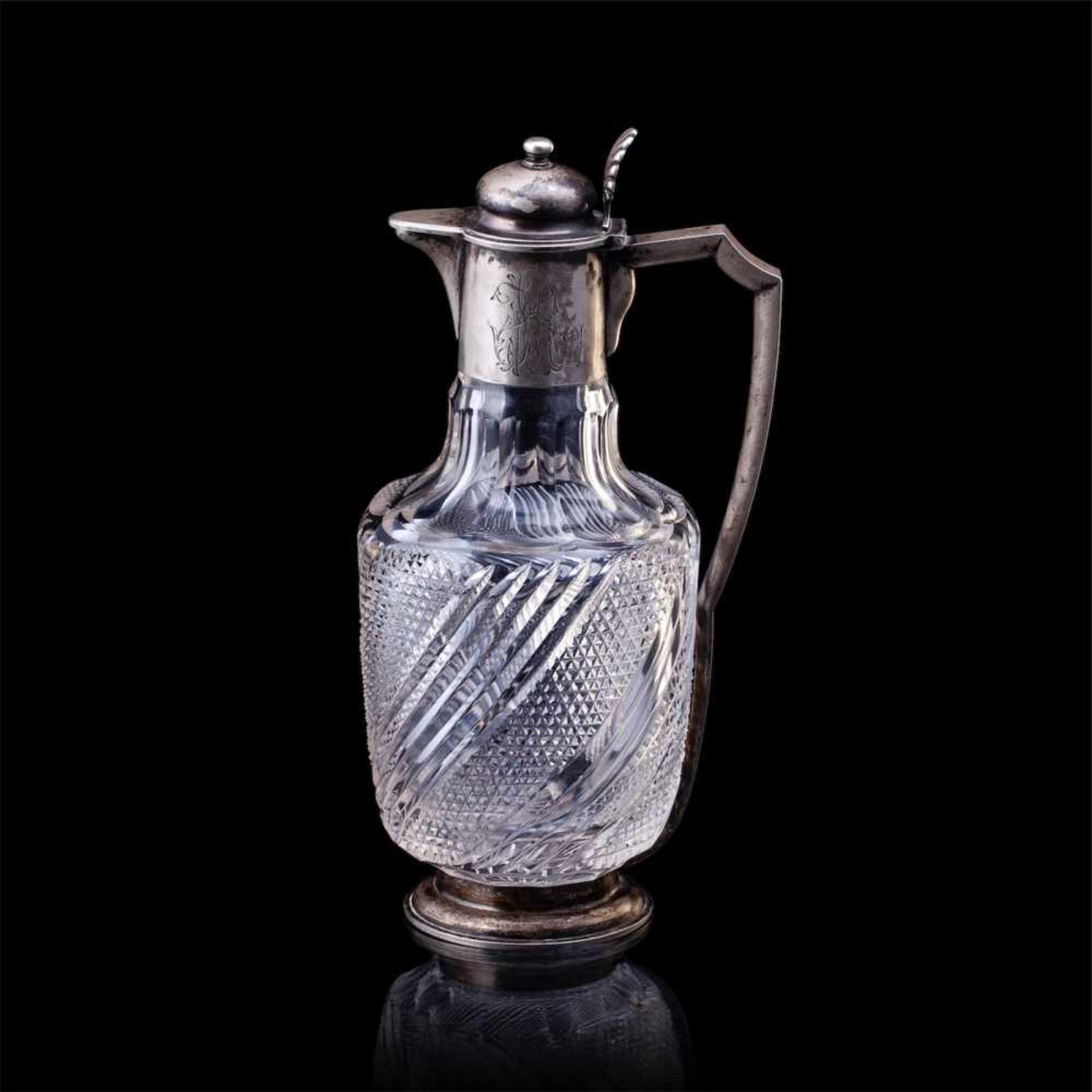 A Russian silver-gilt and cut-glass carafeA Russian silver-gilt and cut-glass carafe in neoclassical