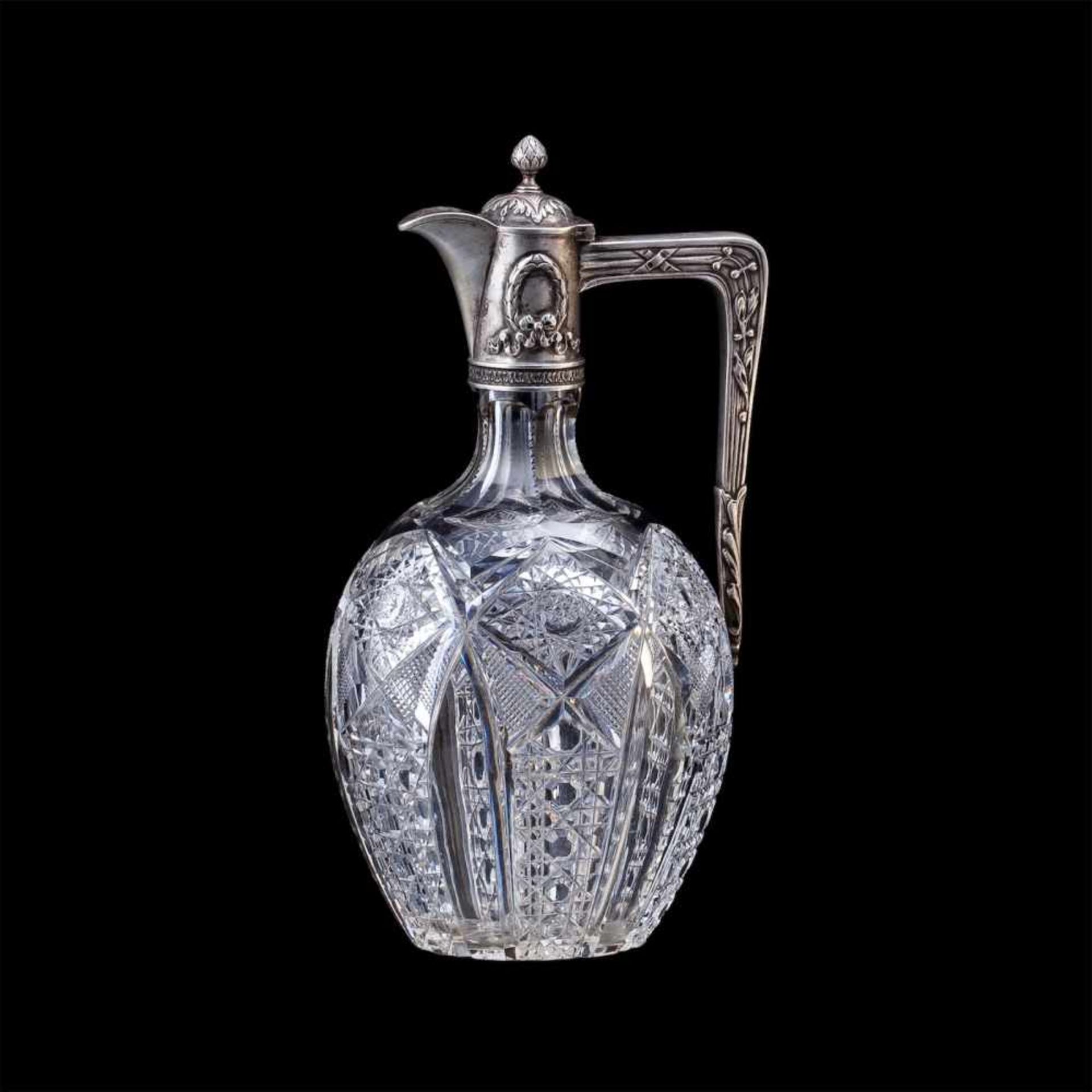 A Russian silver-gilt and cut-glass decanterA Russian Neoclassical style silver-gilt and cut-glass