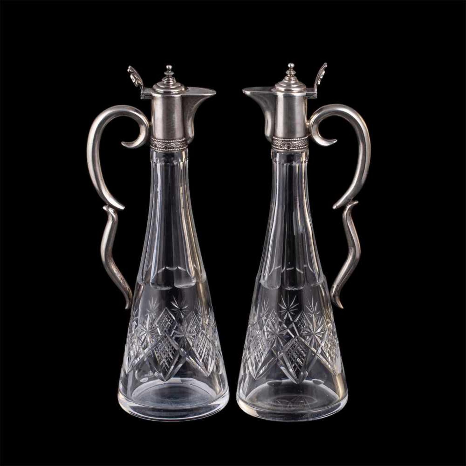 A pair of Russian Neoclassic silver decantersA pair of Russian Neoclassic silver and cut-glass