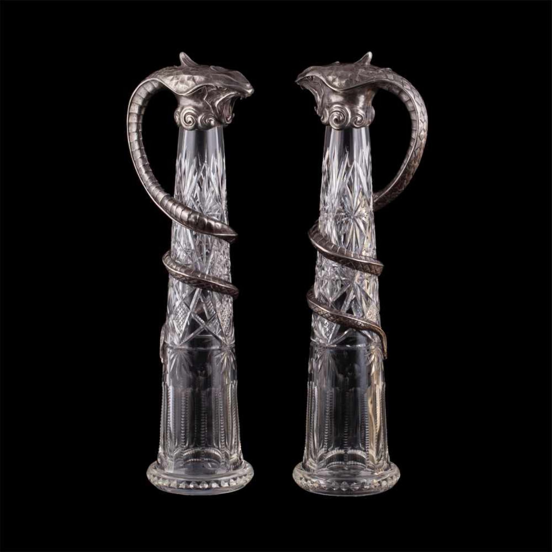 Pair of exceptional sculptural carafesA pair of exeptional Art Nouveau silver-gilt and cut-glass