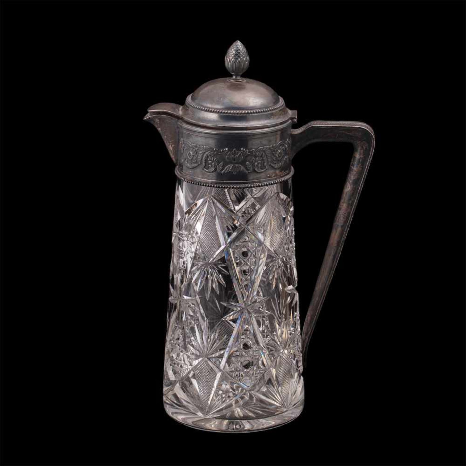 A grand Russian silver-gilt cut-glass decanterA grand Russian silver-gilt cut-glass decanter.