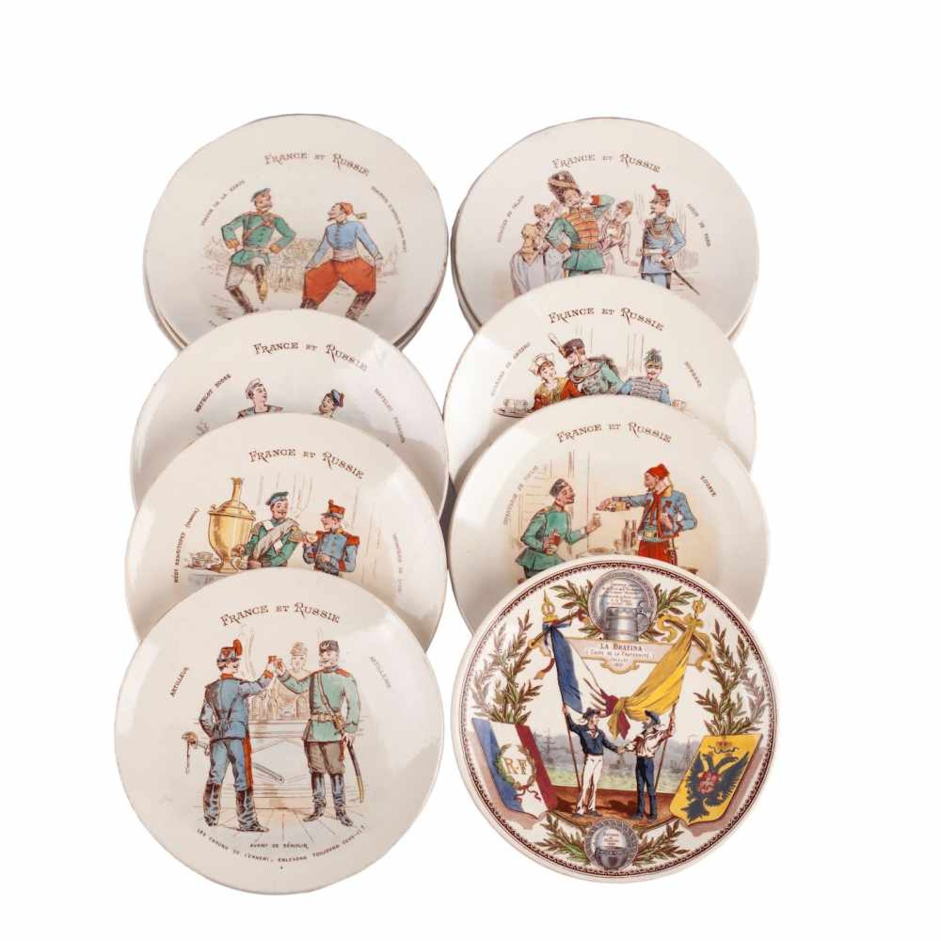 A set of 12 French faience platesA set of 12 French faience plates commemorating the Franco-