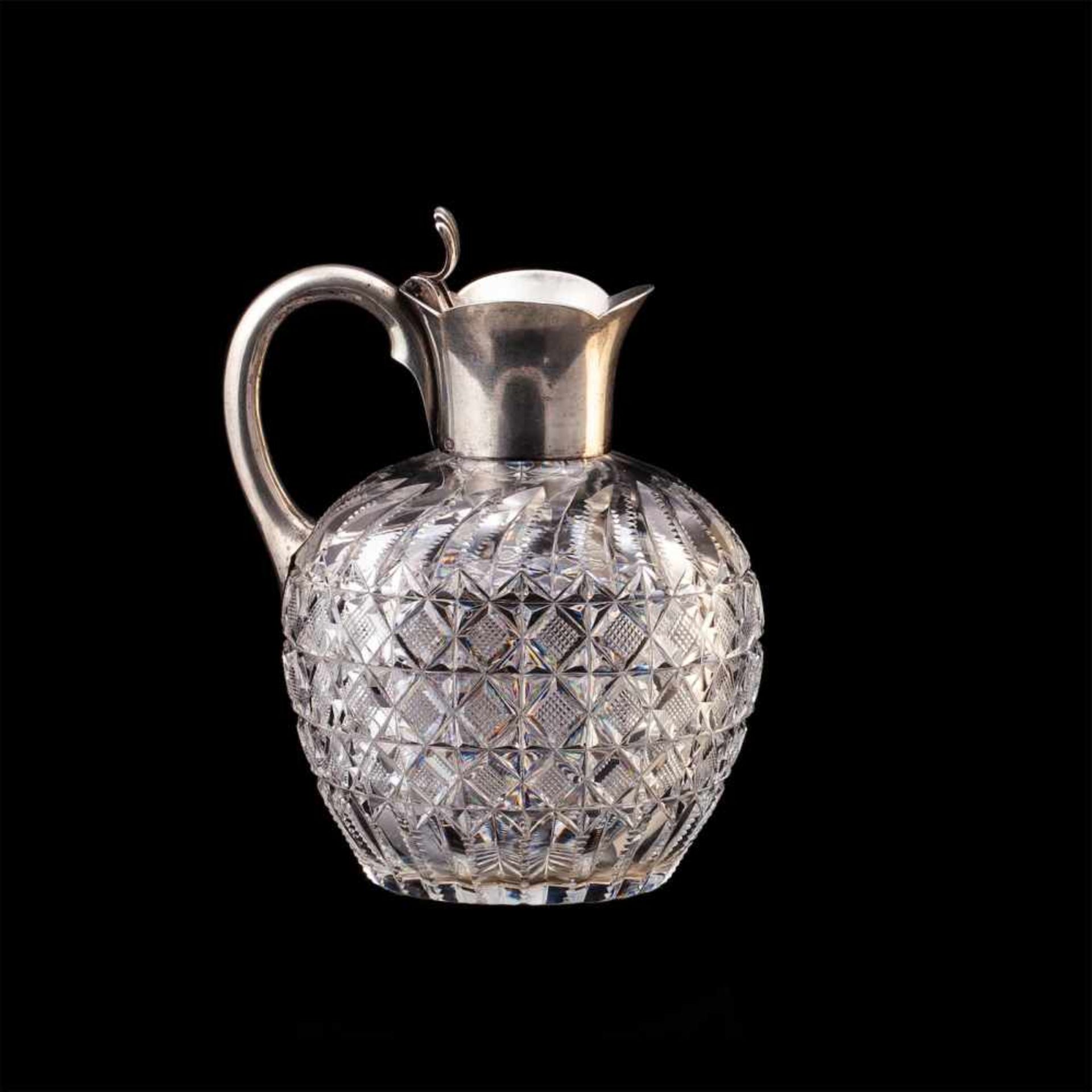 Russian silver-gilt and cut-glass carafeA small Russian silver-gilt and cut-glass carafe in Art