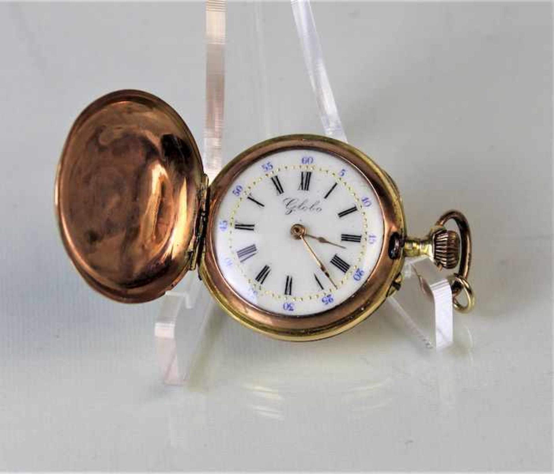 9 Karat Goldene Damen Taschenuhr " Globo "Ref. Nr: 105402 Gewicht: ca. 19,5 g Maße: ca. D. 29 mm