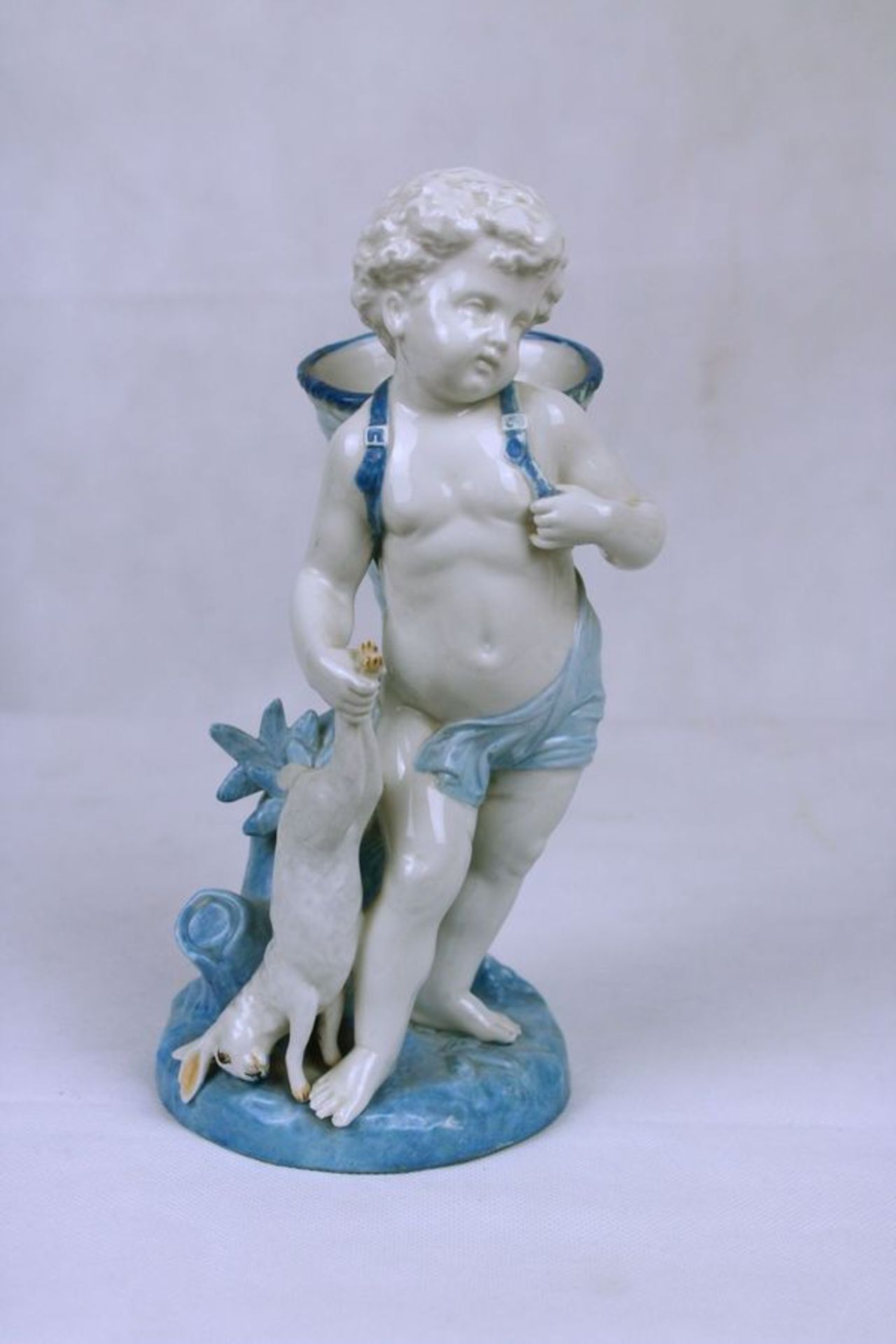 Porzellanfigur "Putto mit Hasen"Porzellan H: 23 cm