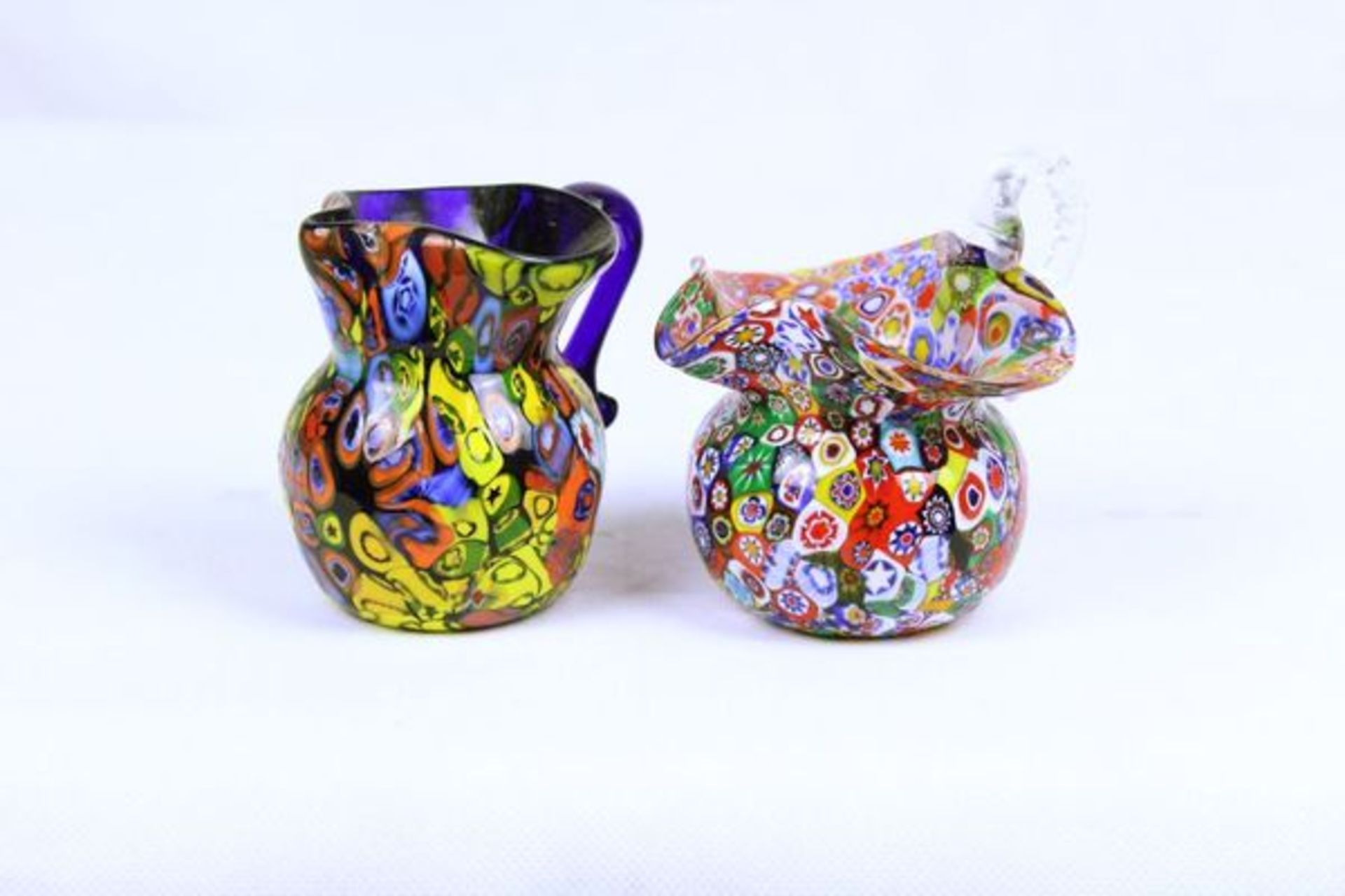Ein Paar Glaskaraffen "Mille Fleurs", MuranoFarbiges Glas Maße: H ca. 8 - 8,5 cm
