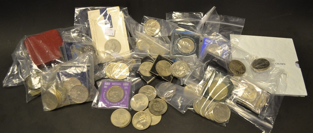 A large collection of UK crown coins in timber box: four 5/- 1953 all in plastic case of issue;