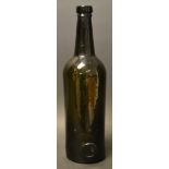 Cambridge University - a 19th century green glass sealed wine bottle, Emmanuel College, 30.