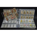 Cigarette Cards - two albums of cigarette cards including Wills Famous Inventions,