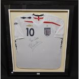 Football - a signed Michael Owen Umbro replica England football shirt, 2007 - 2009, No 10, framed,