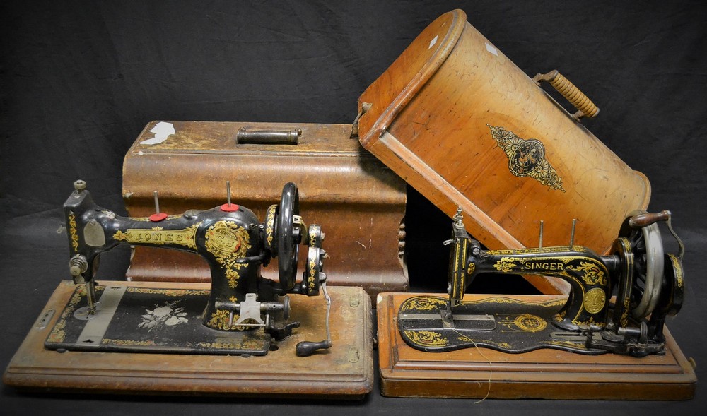 A late 19th century Singer sewing machine, cased; another,