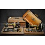 A late 19th century Singer sewing machine, cased; another,