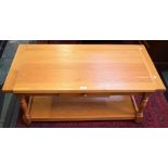 A large light oak coffee table, by Brights of Nettlebed,