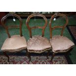 A set of three Victorian mahogany balloon back dining chairs (3)