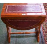 A yew wood dropleaf occasional table