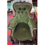 A Victorian mahogany spoon back armchair, c.