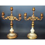 A pair of 19th century alabaster and gilt metal three-light candelabra, waisted sconces,