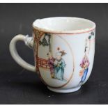 A 19th century Chinese kutani cup, painted with traditional figures, within oval panels,