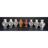 An interesting set of eight Chinese cloisonné enamel miniature vases,