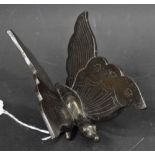 A Japanese silver inlaid dark patinated bronze model, of a butterfly, 12.