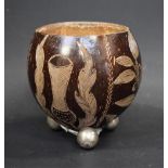 A 19th century coconut cup, sgraffito carved with Scottish thistle, English Rose,