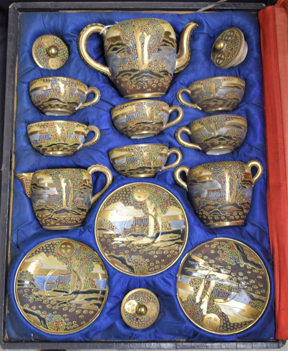 A mid-20th century Japanese Satsuma tea service, for six, comprising tea pot, cups, saucers, etc,