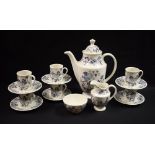 A Royal Doulton Nankin pattern six setting coffee set, comprising cups, saucers, cream jug,