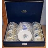 Ceramics - a set of six Royal Worcester coffee cans and saucers, floral pattern on white ground,