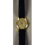 Omega - a ladies Geneve manual wristwatch, oval textured gilt dial, block baton markers,