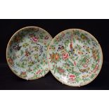 A pair of Chinese Celadon circular plates, decorated with birds,