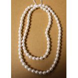 A long single strand white large bead cultured pearl necklace,