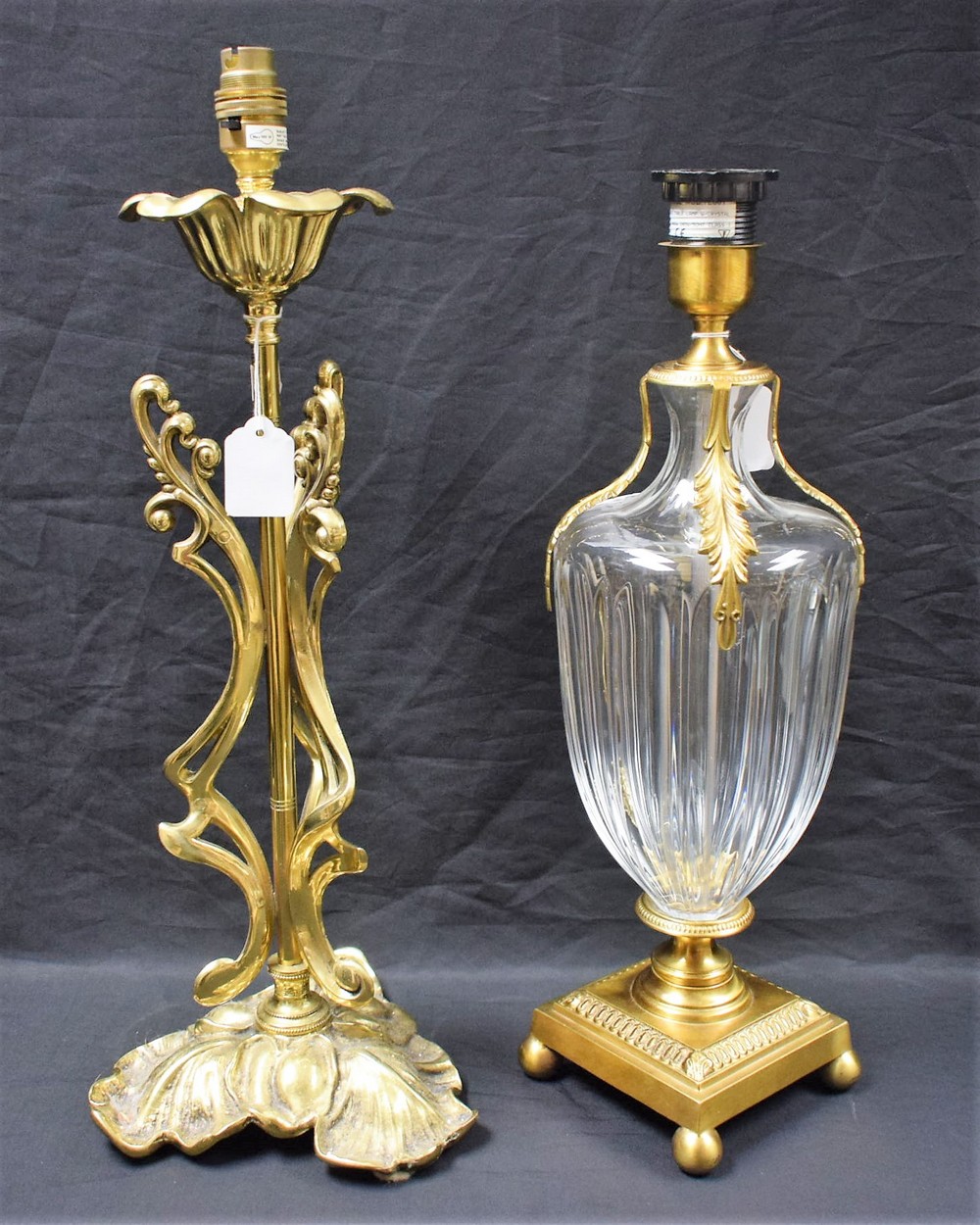 An Art Nouveau style brass table lamp, cast with sinuous stems, leafy trefoil base,